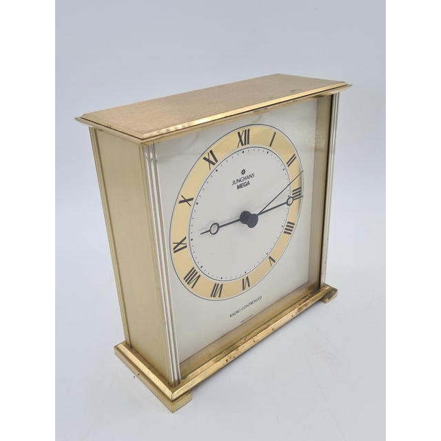 A unique, original junghans mega—a high-quality german radio-controlled table clock, model 385/5021.00, equipped with a...