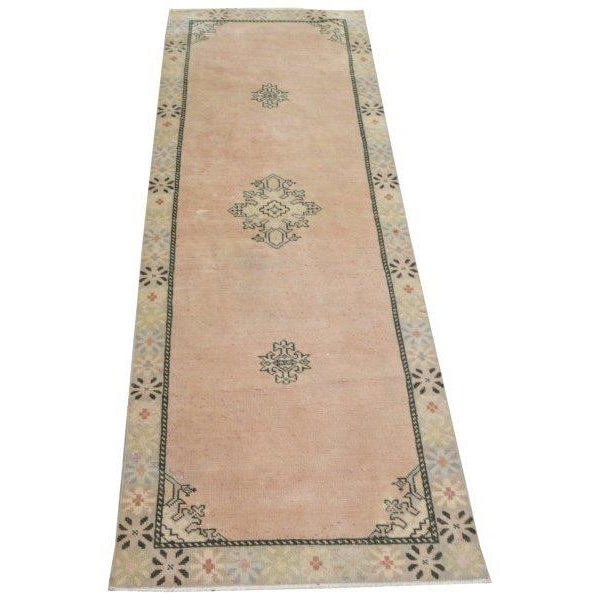 Vintage Turkish Anatolian hand knotted wool rug with natural colors.