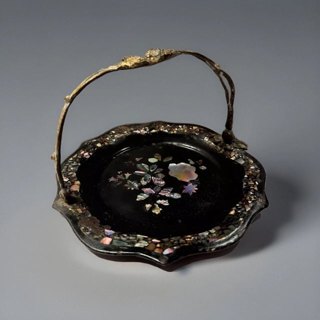 This listing is for an antique Victorian cake basket. This piece is made from paper mache and has gorgeous mother of pearl...