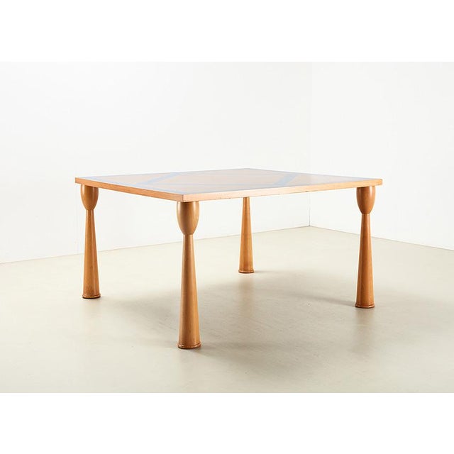 Filicudi square dining table designed by Ettore Sottsass in 1993 for Zanotta Italy. We have two identical tables in stock....