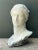This monumental fiberglass sculpture captures the serene countenance of a Roman goddess, rendered in the Neoclassical...
