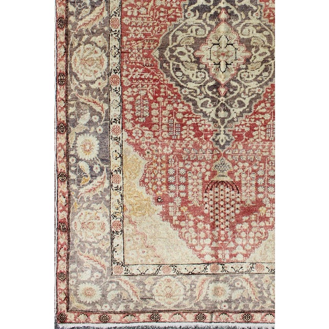 Measures: 4'4 x 7'2. Antique Turkish Oushak Rug in Deep Rose and Charcoal with Ivory Medallion 4′4″ × 7′2″. Keivan Woven...