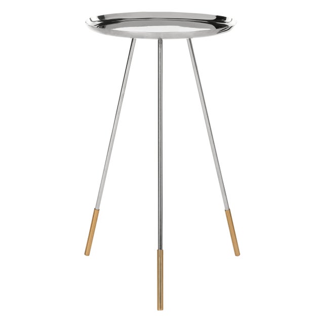 Inspired by the iconic style of Old Hollywood’s screen sirens, this tri-leg contemporary side table was designed for the...