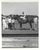July 1965 black and white photograph of Judge Jr in the winner's circle at Marble Downs in Carthage, Missouri. African...