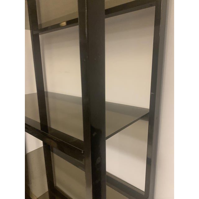 Chrome-plated metal and smoked glass shelf Chrome rectangular frame Five thick smoked glass shelves Good condition...