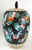 Offering a gorgeous hand painted Chinese porcelain ginger jar, circa Mid 20th Century. This jar is considered "Famille...