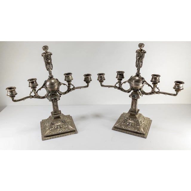 We are selling this very unique and unusual pair of Candelabra. These candelabra have mix of Neoclassical and Art Nouveau...