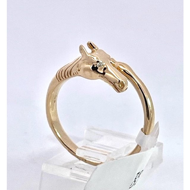 This 14K Yellow Gold ring is Doves by Doran Paloma and it is cute and special. It depicts a horse head and horse hoof is...