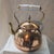 Bring classic Old World charm to your kitchen space with this mid-century rustic tea kettle. Beautifully crafted from...