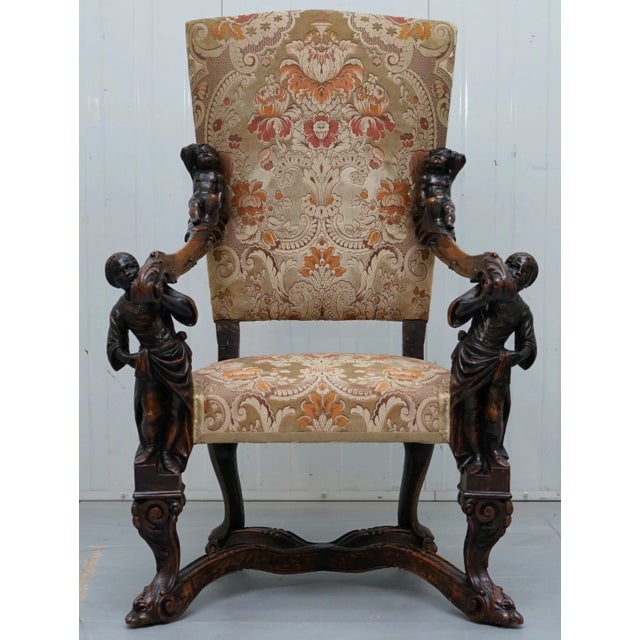 An absolute masterpiece of 19th-century Italian furniture design, this extraordinary armchair is hand-carved by the world-...