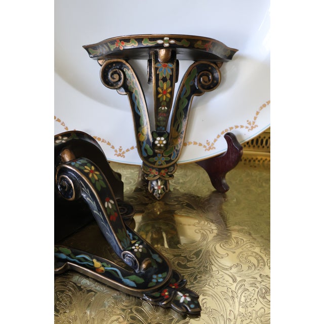 A distinctive pair of vintage wooden wall bracket shelves, attributed to India and individually hand-painted with...