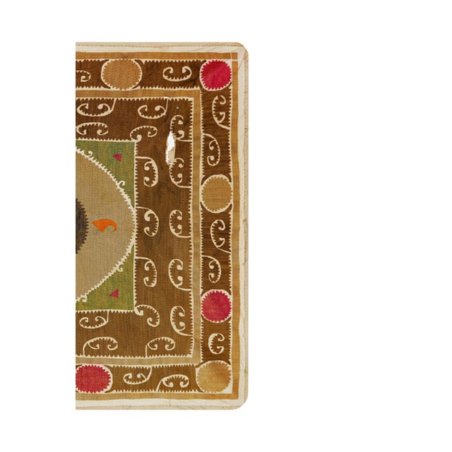 Vintage Suzani from Samarkand, circa 1900s. There are tears on this suzani. Dimension 42'' x 50'' inches /107 x 126 cm /...