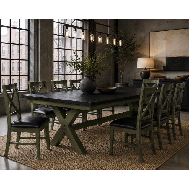 A substantial architectural dining collection featuring a double X-trestle extension table and eight matching X-back...