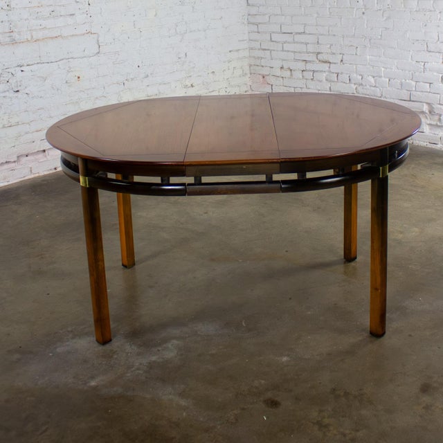 Wood Mid-20th Century MCM to Campaign Style Round to Oval Expanding Dining Table Attributed to Tung Si Collection by Hickory Manufacturing For Sale - Image 7 of 18