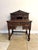 Fine quality antique Victorian carved oak writing desk, having a quality antique Victorian writing desk with a raised back...
