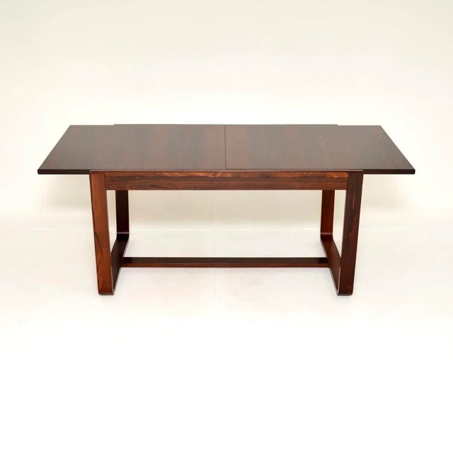 A beautiful and very stylish vintage dining table by Uniflex. This was designed by Gunther Hoffstead, it was made in...
