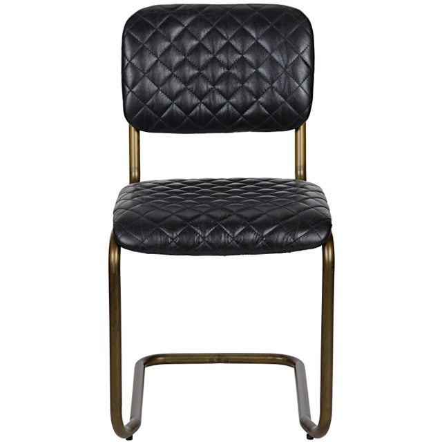 A quilted black leather seat and back updates our version of a classic armless dining chair. Seat Height (in:): 19