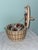 Charming vintage wicker sewing basket featuring a beautiful floral fabric-covered lid and original woven handle. This...