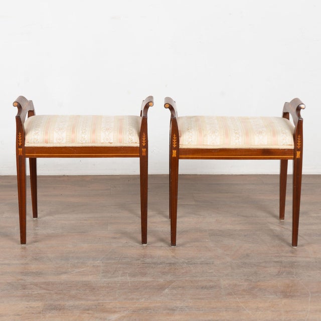 Pair of 20th century Danish stools or tabourets, crafted in mahogany with graceful, well-balanced lines. Simple decorative...