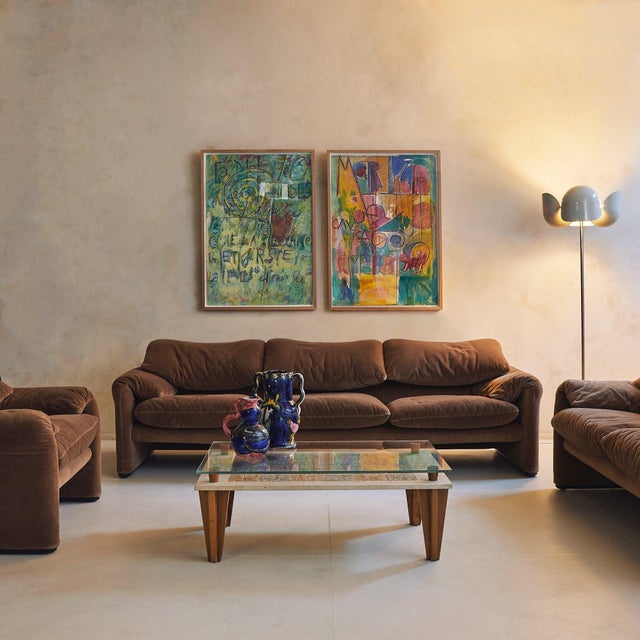 An Italian Maralunga armchair designed by Vico Magistretti for Cassina in the 1970s. Upholstered in rich brown velvet,...