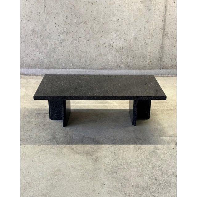 Meet the Postmodern Brutalist Granite Coffee Table. This striking piece combines raw, industrial power with an avant-garde...