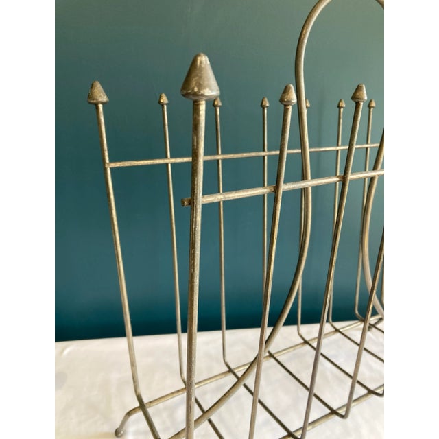 This distinctive magazine rack represents functional mid-century design and stands out among vintage finds for its...