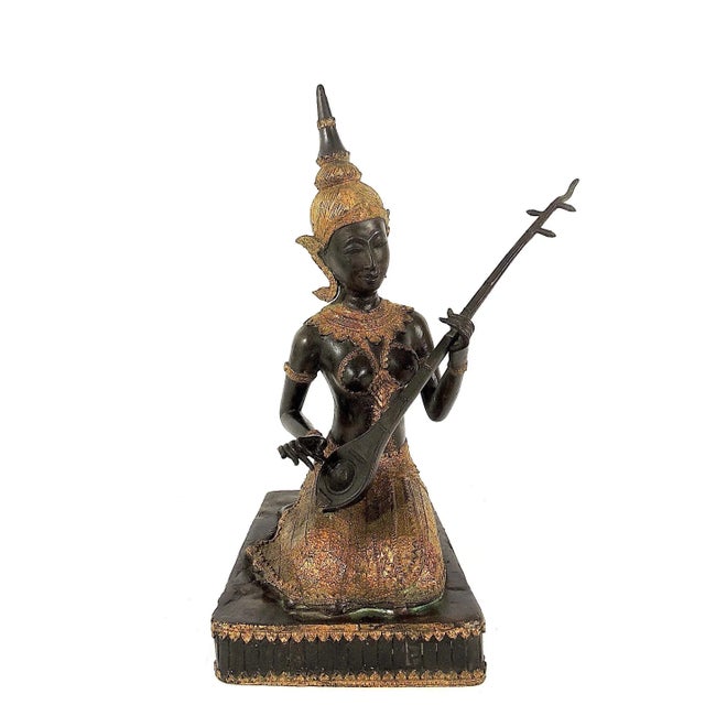 An early 20th. Century reproduction styled upon figures from the Thai Rattanakosin Kingdom 1782-1932. This female figure...
