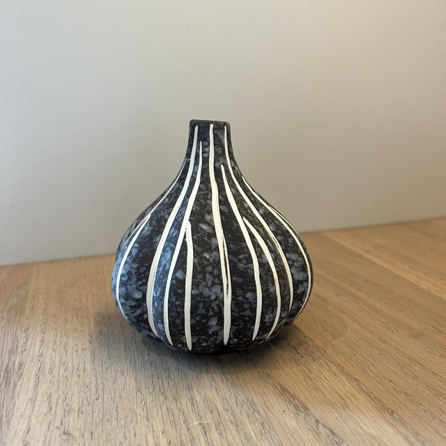 Delightfully unique bud vase in abstracted gourd shape by unknown maker. Surprisingly impactful for such a petite...
