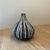 Delightfully unique bud vase in abstracted gourd shape by unknown maker. Surprisingly impactful for such a petite...