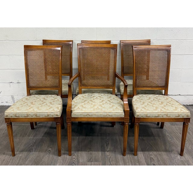 This is a gorgeous set of six vintage dining chairs by Ranck Furniture, crafted in solid cherry with elegant Regency...