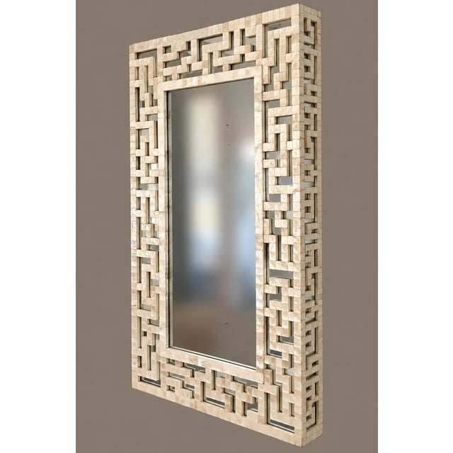 This Neiman Marcus Capiz Shell Mirror is a high-end, handcrafted piece, sourced through the luxury retailer's imported...