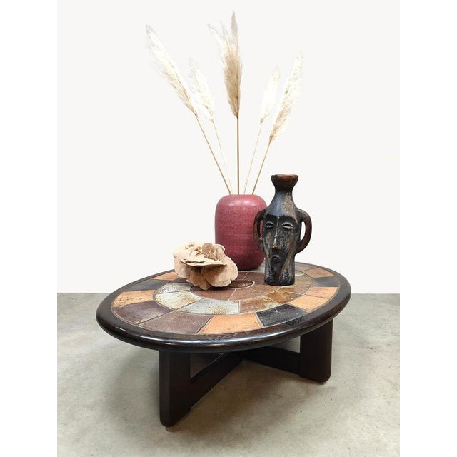 Immerse yourself completely in mid-century modern style with this designer coffee table by Tue Poulsen for Haslev...