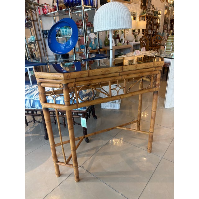 Vintage Brighton style rattan woven cane glass top tortoise demi lune console table. original glass top. No damage or...