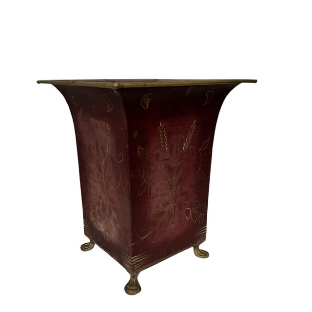 Vintage large red with gilt accents footed cachepot. Made in India. Measures 10.5” square x 12.5” h.