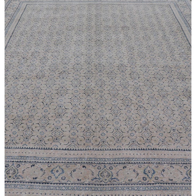 Measures: 10'2 x 13'6 Antique Persian Tabriz Rug with All-Over Small Tribal Design in Muted Tones. Keivan Woven Arts / rug...