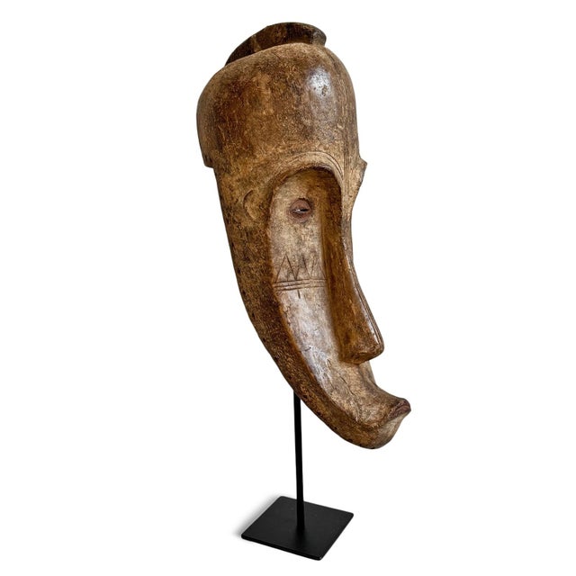 Antique mask from the Ngil secret judicial society within the Fang people of Gabon. These masks were originally worn...