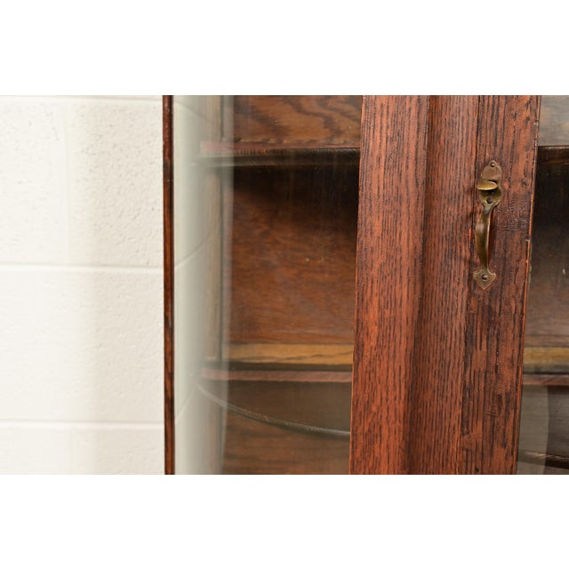 Brown Antique Victorian Carved Oak Curved Glass Bookcase or Display Cabinet by Larkin Co., Circa 1900 For Sale - Image 8 of 15