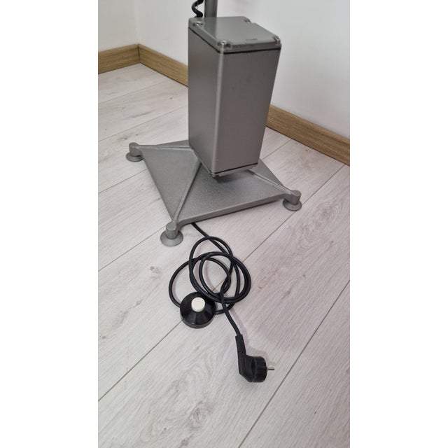 Lingotto Floor Lamp in Cast Iron and Steel by Renzo Piano for Guzzini, in Very Good conditions. Designed 1990 to 1999 This...