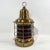 Brass ships anchor lantern with a really rich port wine red fresnel lens by Perkins Marine Lamp Corporation of Brooklyn,...