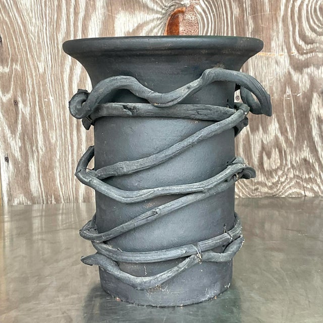 A fantastic vintage Boho vase. A chic hand made studio pottery vase wrapped in a heavy grape vine. Both are roughly...