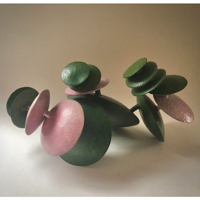 Cecilia Moore works and lives in Dublin, Ireland. Her work combine an ancient silversmithing Hammering technique, with...