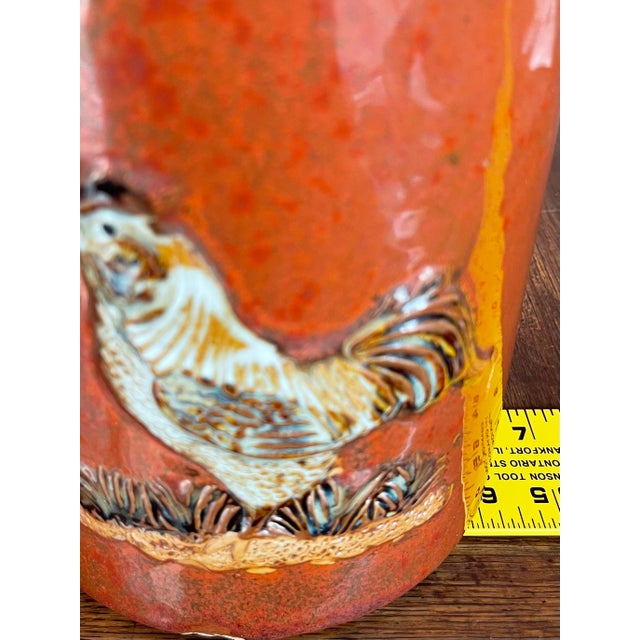 Farmhouse Mid 20th Century Vintage Stoneware Ceramic Two-Toned Gloss Glazed Red & Brown Whiskey Jug Rooster Relief Motif Farmhouse Country For Sale - Image 3 of 8