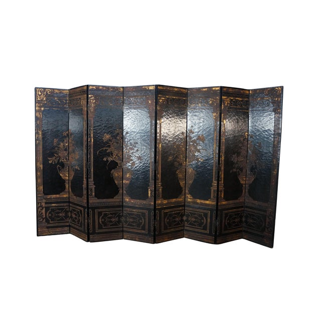 A very large and impressive vintage eight panel black lacquer gilt-decorated folding screen, featuring classic Chinoiserie...