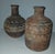 A pair of made in Mexico clay vases by Luis del Toro. Hand crafted and decorated, signed in ink on bottoms. Natural clay...