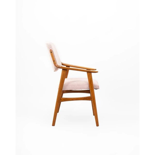 Original Scandinavian armchair of the 1960’s. Sound wood design with original stubborn plans in one piece in boomerang...