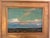 Look at the colors in this beautiful painting. Serene painting of a water scene with clouds in the sky. Painted by...
