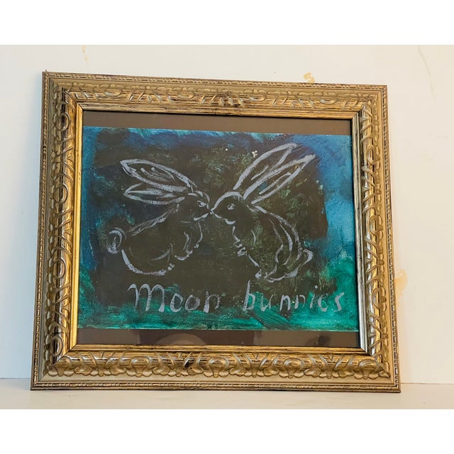 Abstract original painting on oil on canvas Moon Bunnies by Elia from Moon Series, framed in a silver tone ornate frame.