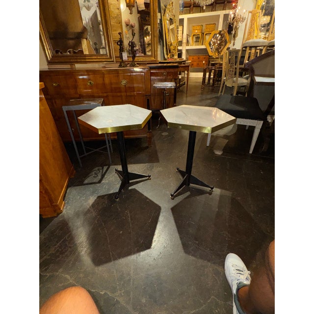 This pair of Italian modern black steel and marble hex tables exudes sophistication and elegance in any home decor. The...