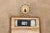 Vintage brass U.S. Post Office mailbox door with a Greek key pattern and a window plate displaying the box number 601....
