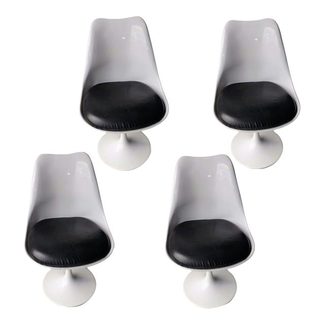 1970s Four Swivel Tulip Chairs With Cushioned Seat and Curved Backrest For Sale